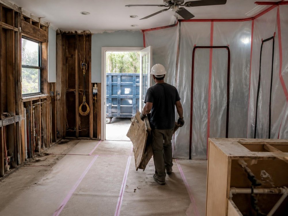 Demo day: old kitchen torn out, dust walls up