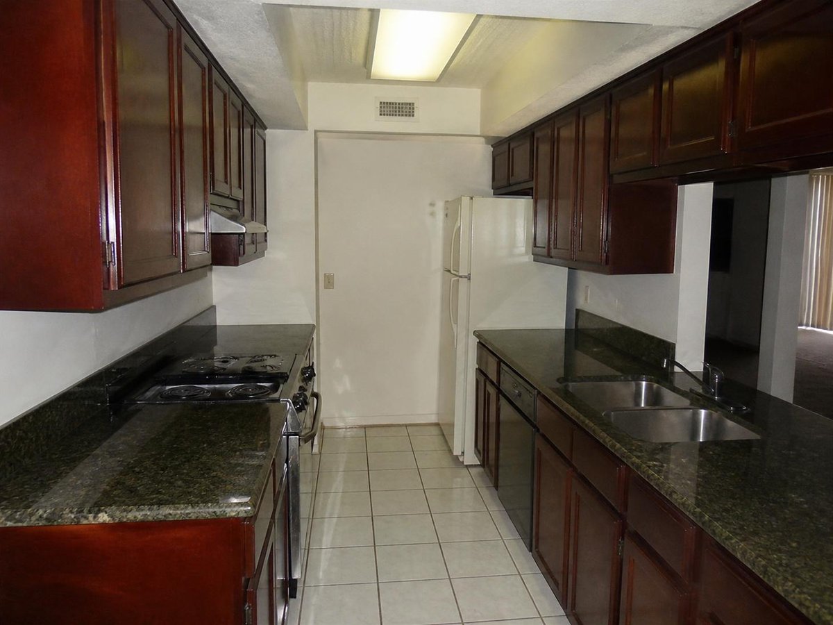 Plantation galley to open kitchen, before