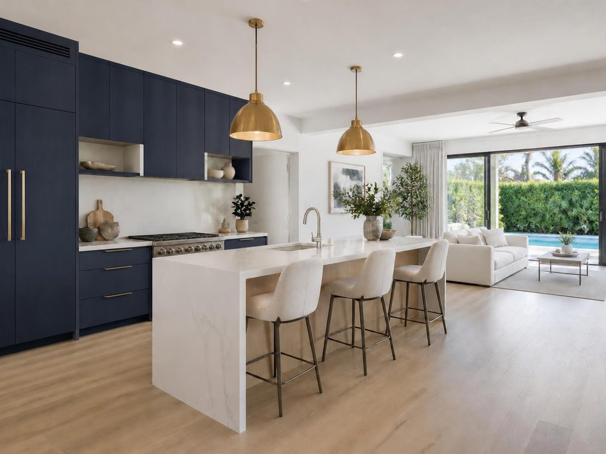 Kitchen with deep navy cabinets